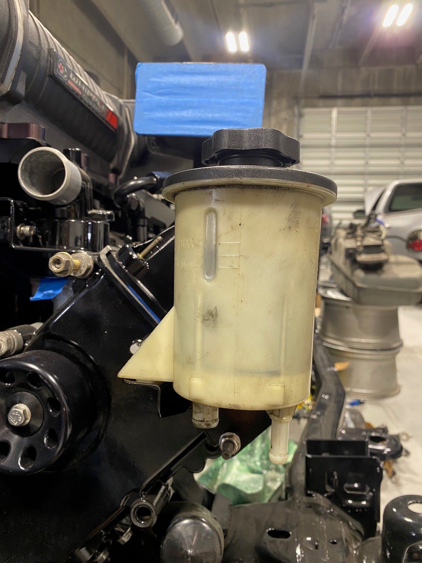 Power Steering Tank Relocation Bracket